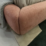 Soft Pink Upholstered Bed with Oversized Cushion Headboard & Rounded Base